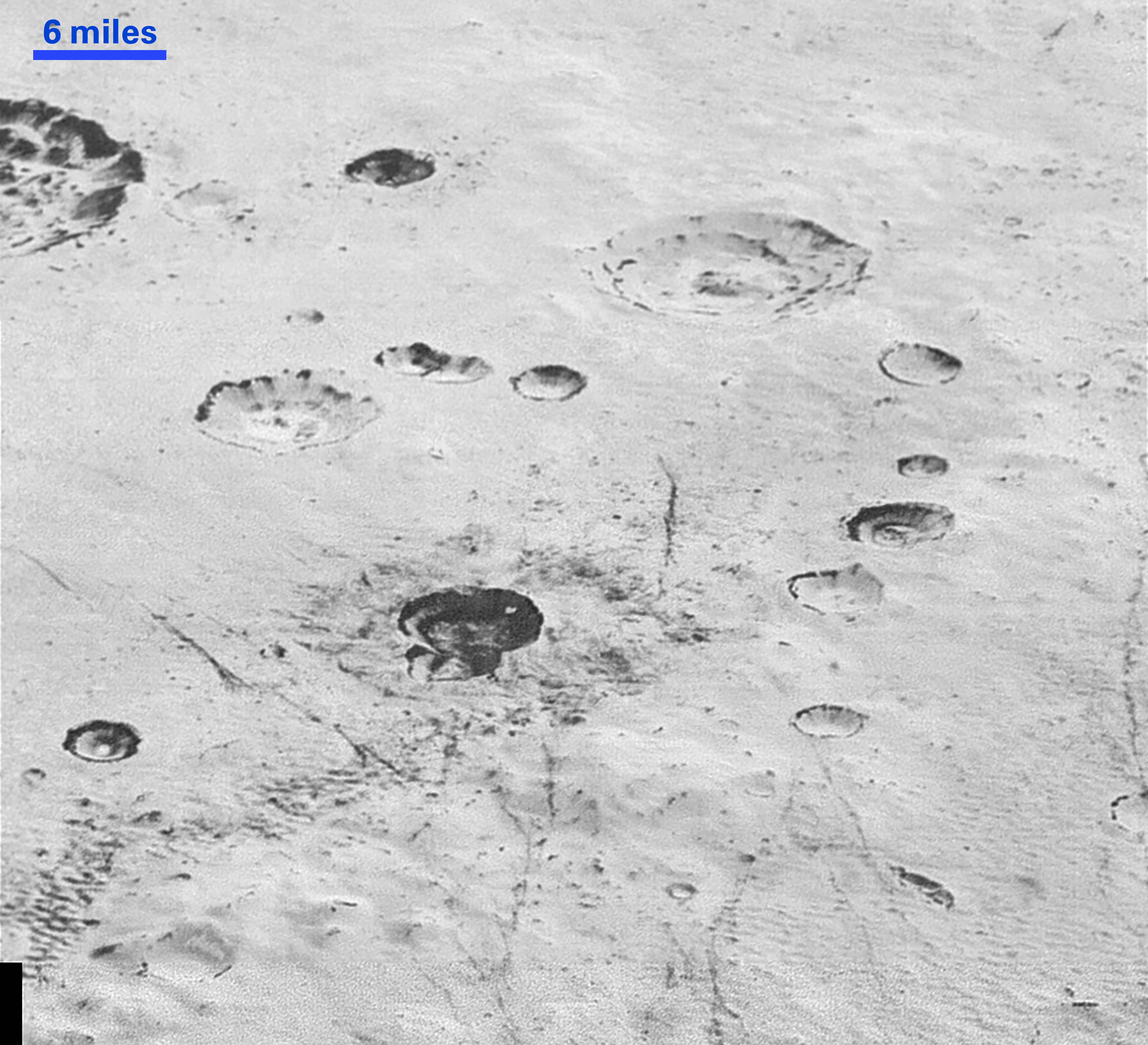 Cratères et Plaines gelées de Pluton photographiés par la sonde New Horizons le 14/07/15 (Credits: NASA/Johns Hopkins University Applied Physics Laboratory/Southwest Research Institute)